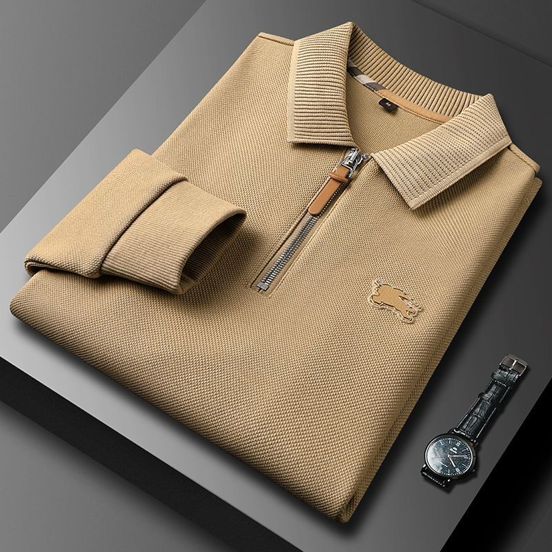 Embellished with a distinctive golden rabbit emblem on the chest