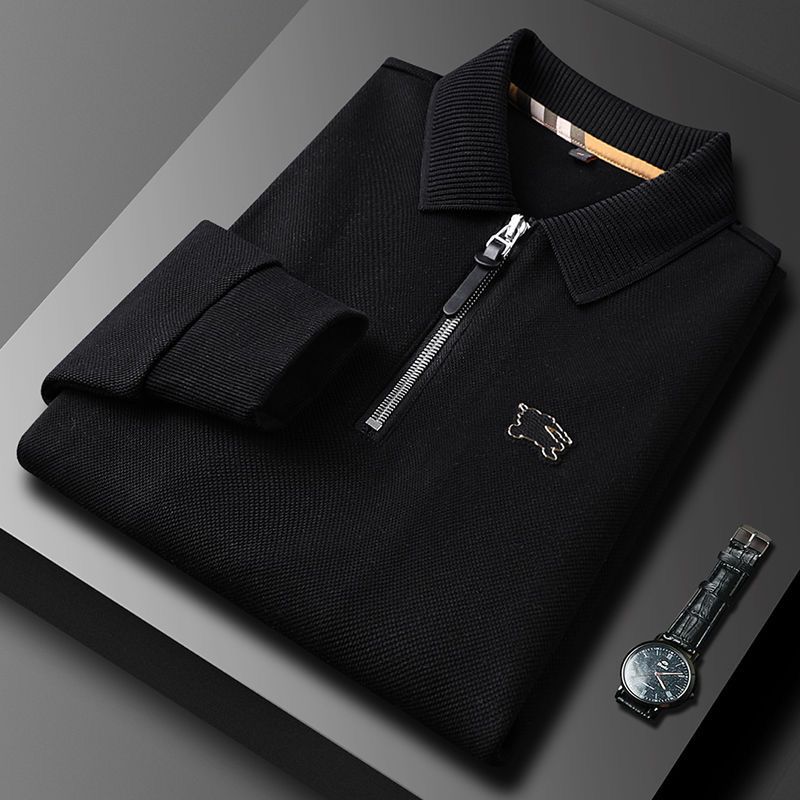 Embellished with a distinctive golden rabbit emblem on the chest